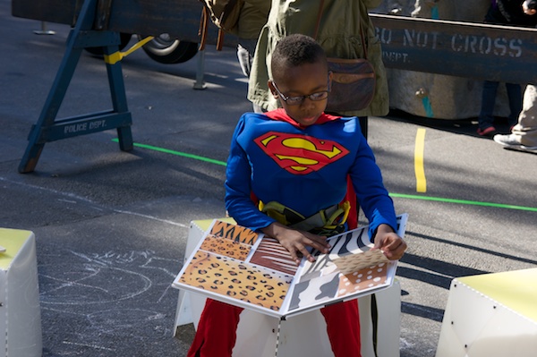 Superman kept coming back. Read books between dominating turns on the climbing wall.