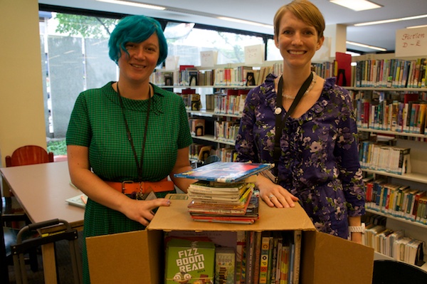 BPL Librarians with books chosen for the Boston Uni on the Greenway.