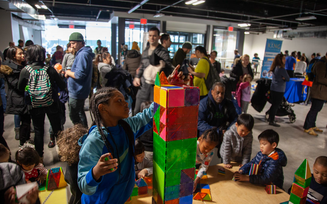 Building together at a Brooklyn indoor block party