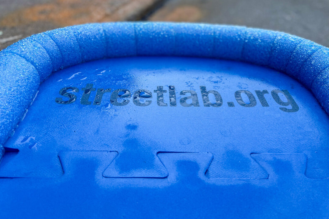A close-up view of a blue foam pop-up structure.