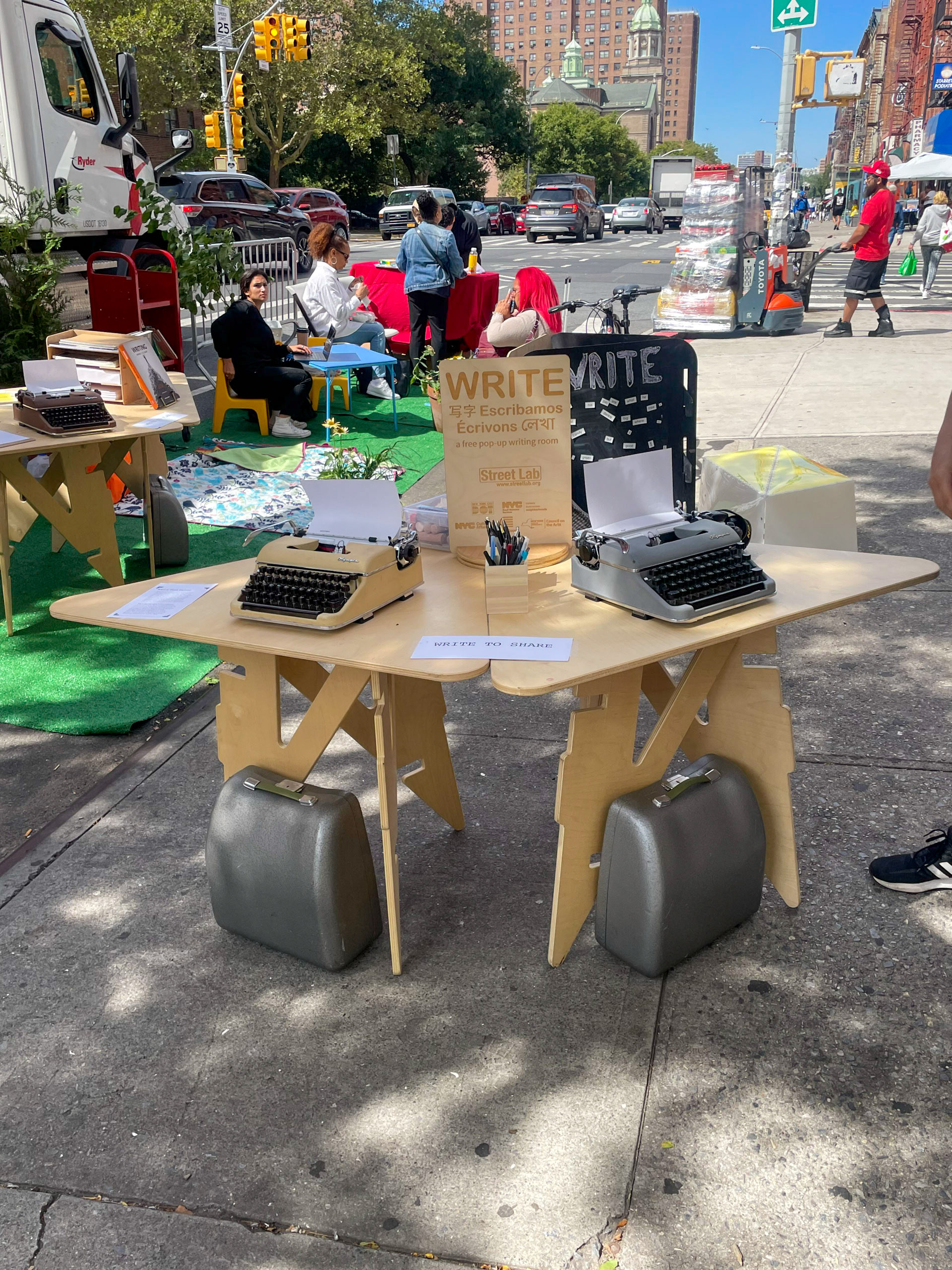 a car-free open street with children and adults engaging in different activities