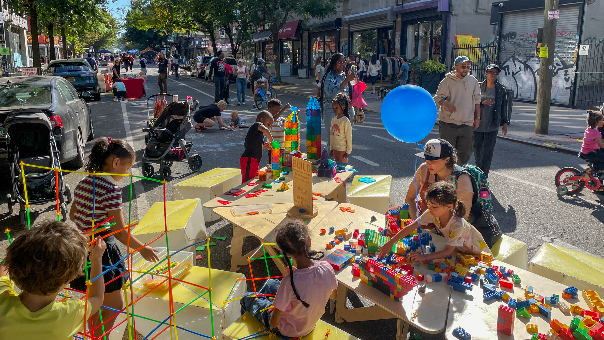 A view of a vivid blue foam structure on the street.